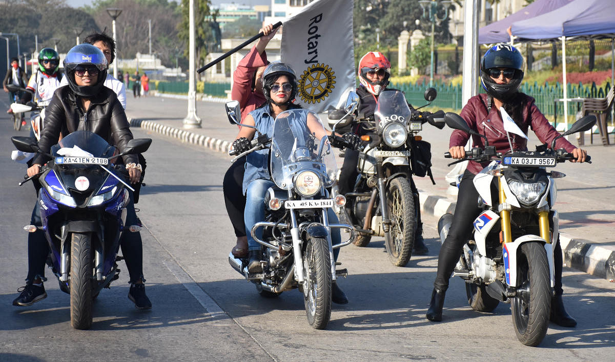 Female motorcyclists during a rally organised by the Rotary Club of Bangalore on International Women’s Day on Tuesday. Credit: DH Photo
