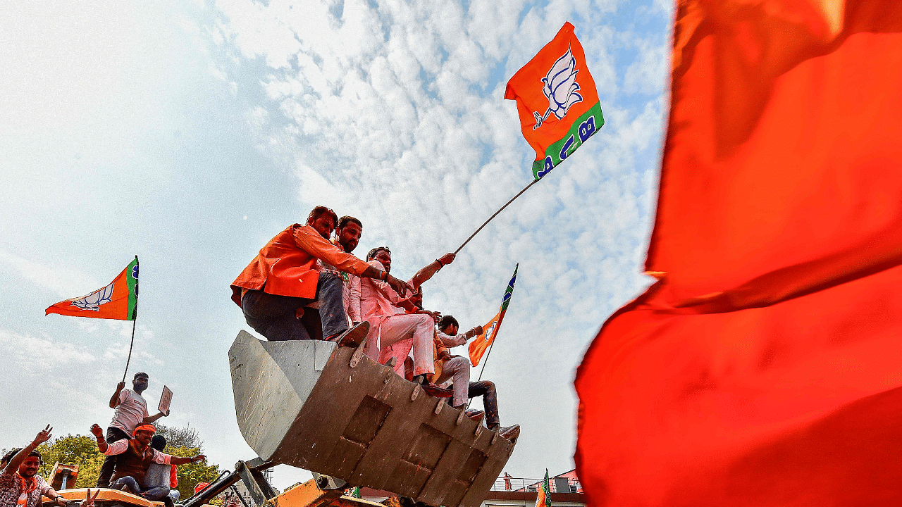 Supporters of India's Bharatiya Janata Party (BJP) celebrate outside the party office in Lucknow. Credit: AFP Photo