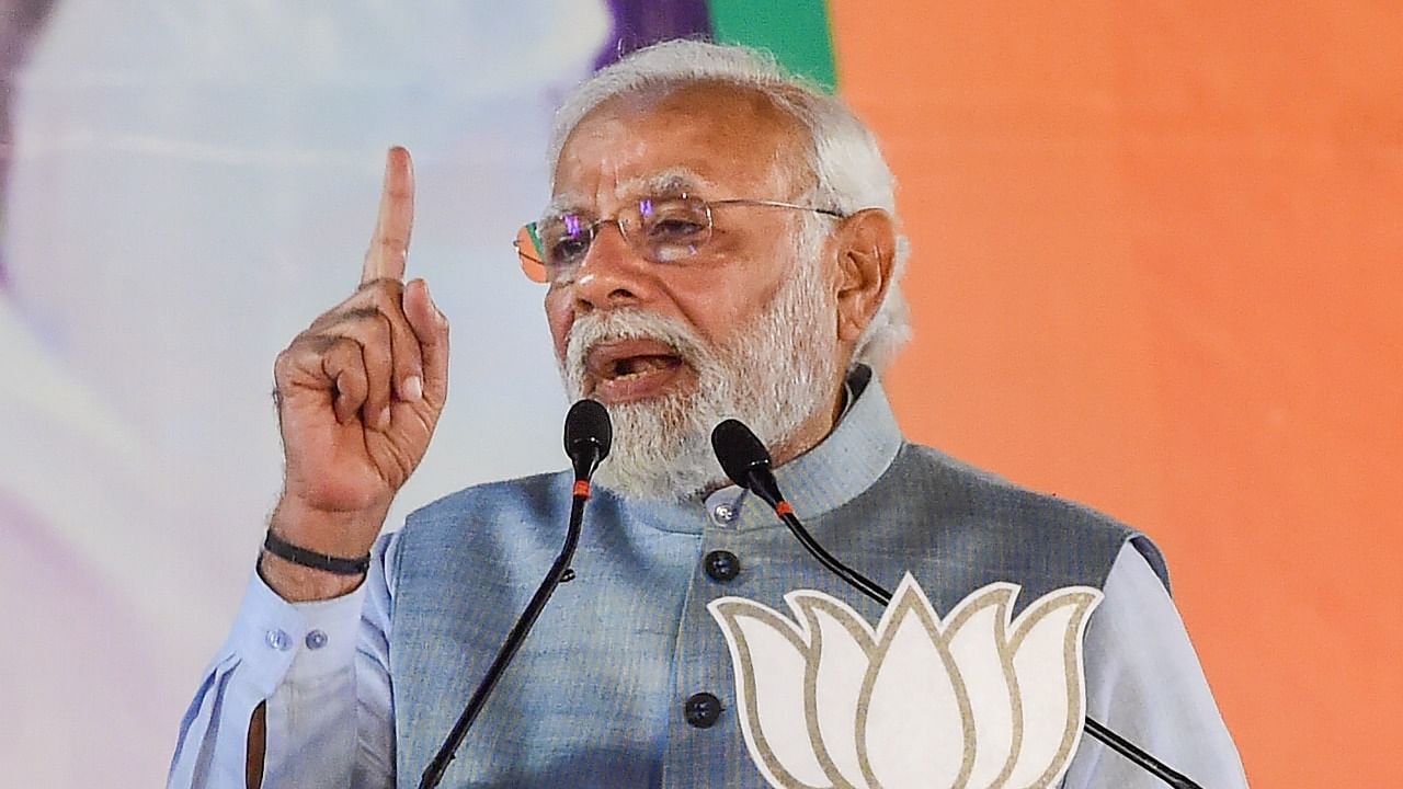 Prime Minister Narendra Modi addresses BJP leaders and workers during celebrations at the BJP Headquarters following the party's win in Assembly elections of four states. Credit: PTI Photo