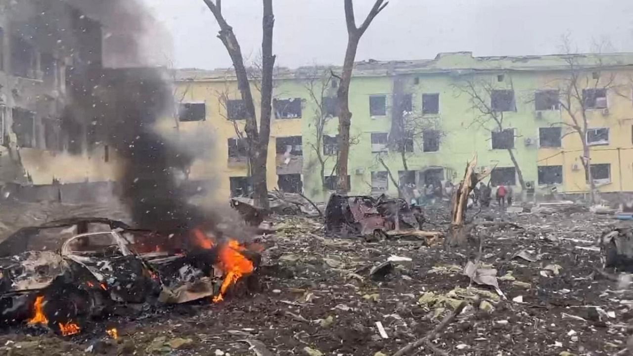 A view shows cars and a building of a hospital destroyed by an aviation strike amid Russia's invasion of Ukraine, in Mariupol. Credit: Reuters photo