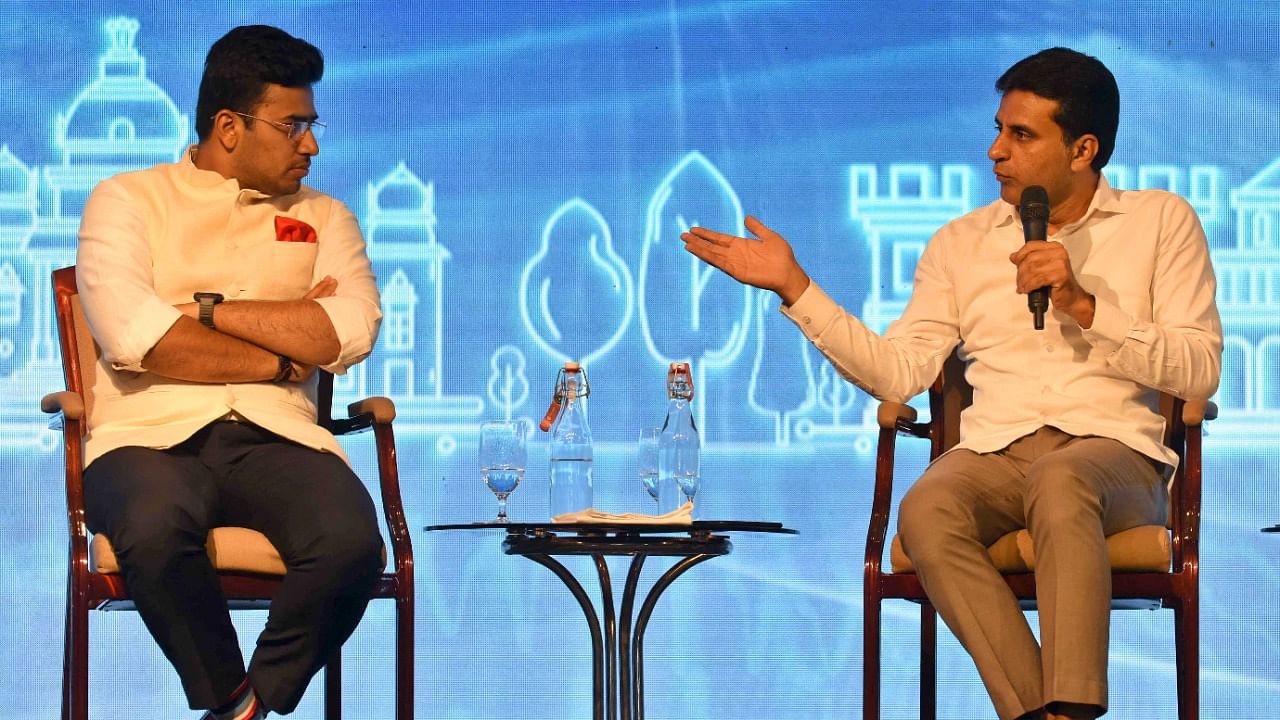 Bangalore South MP Tejasvi Surya (L) and Shivajinagar MLA Rizwan Arshad during a discussion at the DH Bengaluru 2040 summit. Credit: DH Photo/Pushkar V