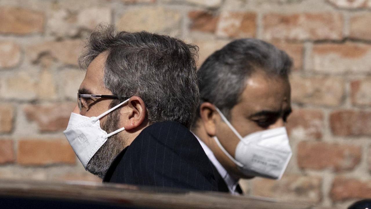 Iran's chief nuclear negotiator Ali Bagheri Kani (L) is leaving the Coburg Palais, the venue of the Joint Comprehensive Plan of Action (JCPOA), after his meeting with Deputy Secretary General of the European External Action Service (EEAS) Enrique Mora (not pictured), in Vienna. Credit: AFP Photo