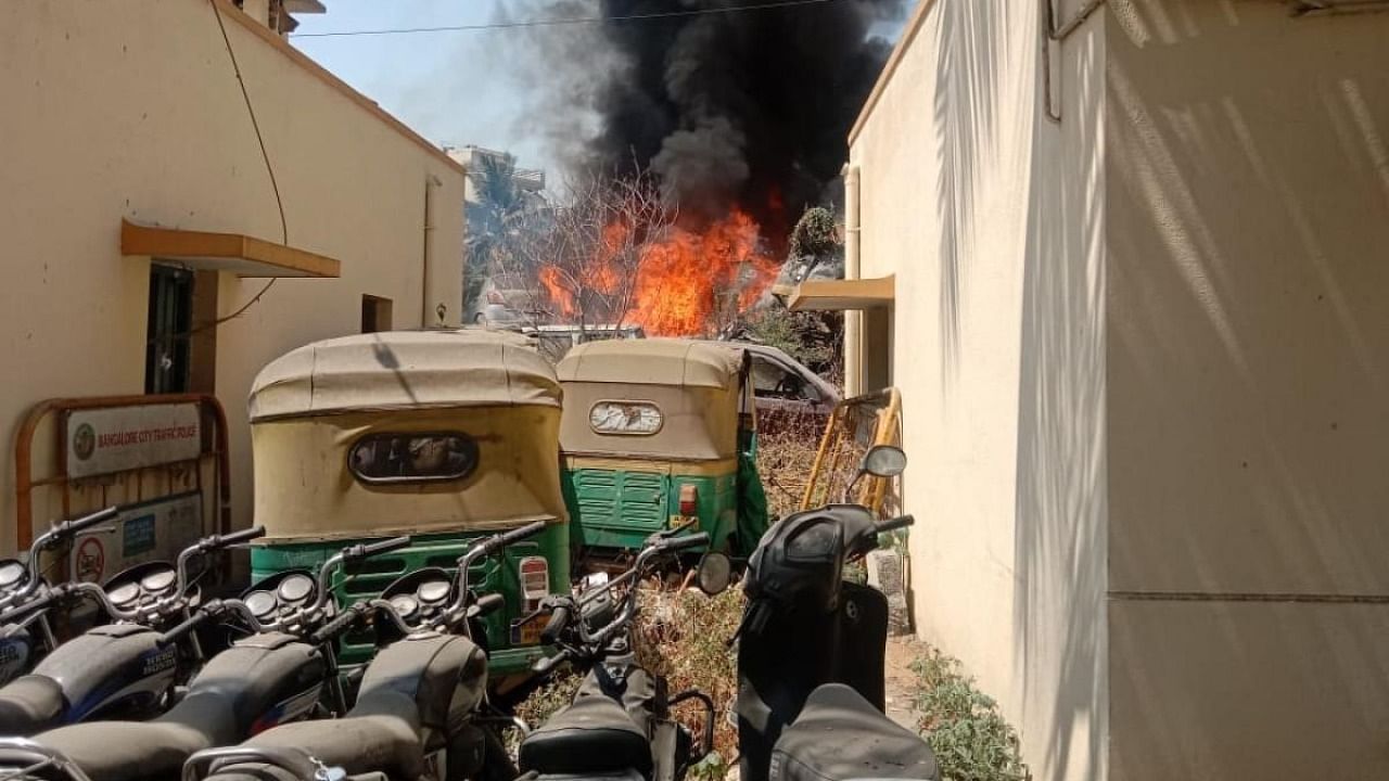 Vehicles parked at the Kengeri police station caught fire on Friday. Credit: Special arrangement