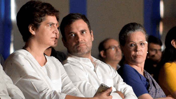 Congress Interim President Sonia Gandhi with party leader Rahul Gandhi and Priyanka Gandhi Vadra. Credit: PTI Photo