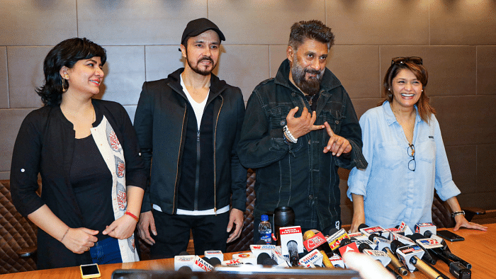Bollywood filmmaker Vivek Agnihotri with actors Pallavi Joshi, Darshan Kumar, and Bhasha Sumbli talk to the media, at a press conference for the promotions of their upcoming film 'The Kashmir Files'. Credit: PTI Photo