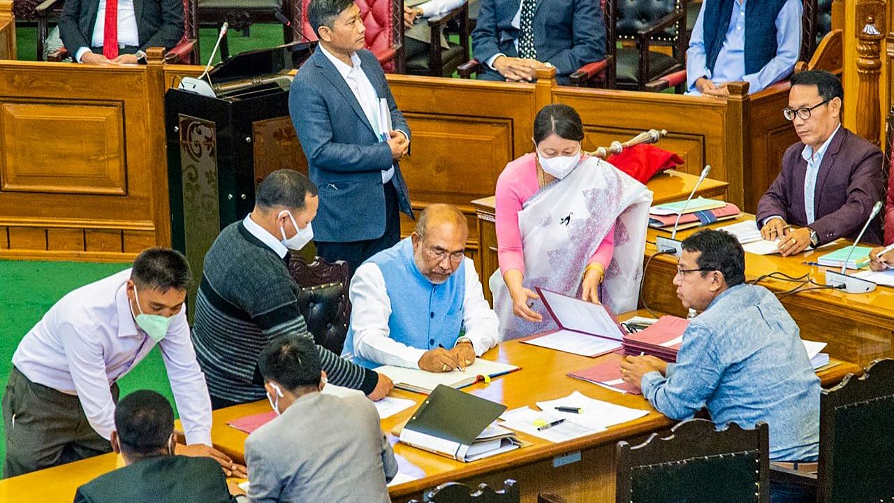 BJP leader Nongthombam Biren Singh takes oath as a member of the 12th Manipur Legislative Assembly at the Assembly Hall in Imphal. Credit: PTI Photo