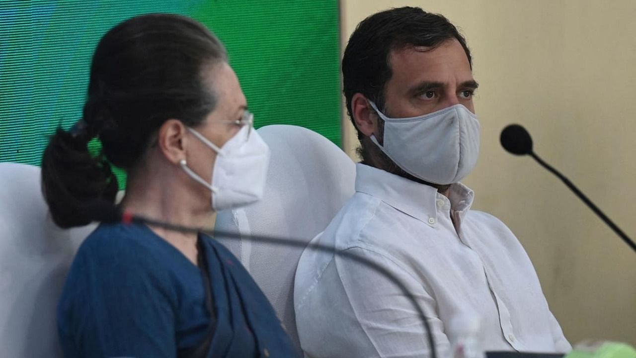 Congress party leaders Sonia Gandhi and Rahul Gandhi attend the Congress Working Committee (CWC) meeting at the All India Congress Committee (AICC) office in New Delhi. Credit: AFP Photo