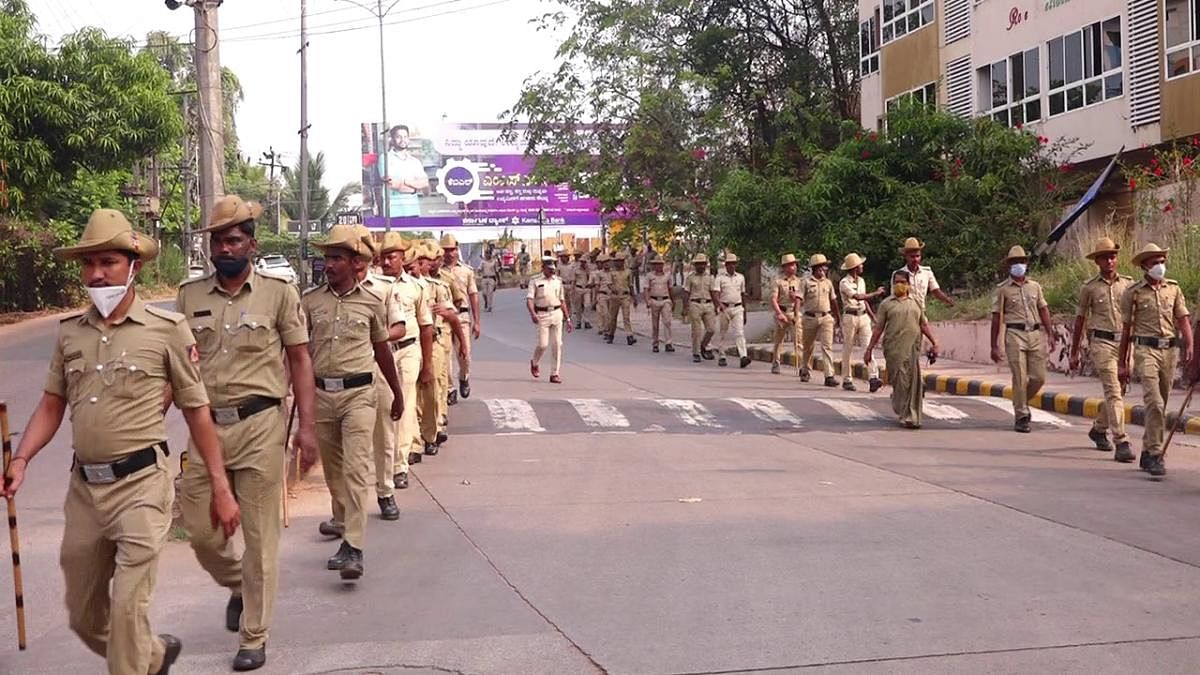 The police personnel take out route march in Mangaluru.