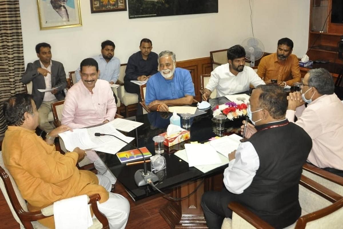 Union Minister Nitin Gadkari chairs a meeting to discuss the toll plaza at Surathkal, in New Delhi. The meeting was attended by Dakshina Kannada MP Nalin Kumar Kateel.