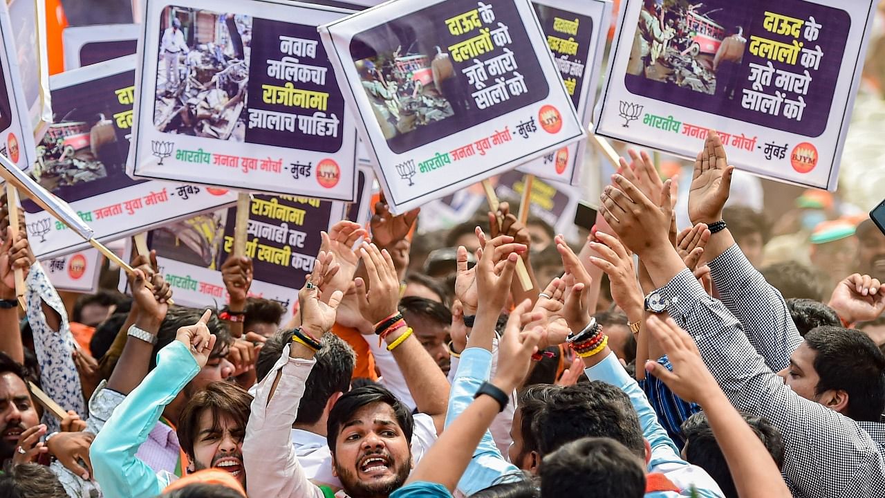 BJP workers protest against Maharashtra government demanding the resignation of Maharashtra Minister of Minority Development Nawab Malik at Azad Maidan, in Mumbai, Wednesday, March 9, 2022. Credit: PTI Photo
