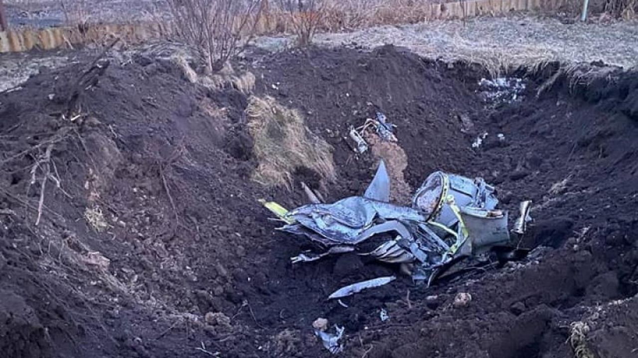 The remains of a missile are seen landed at a backyard of a residential house in Kyiv. Credit: Reuters Photo