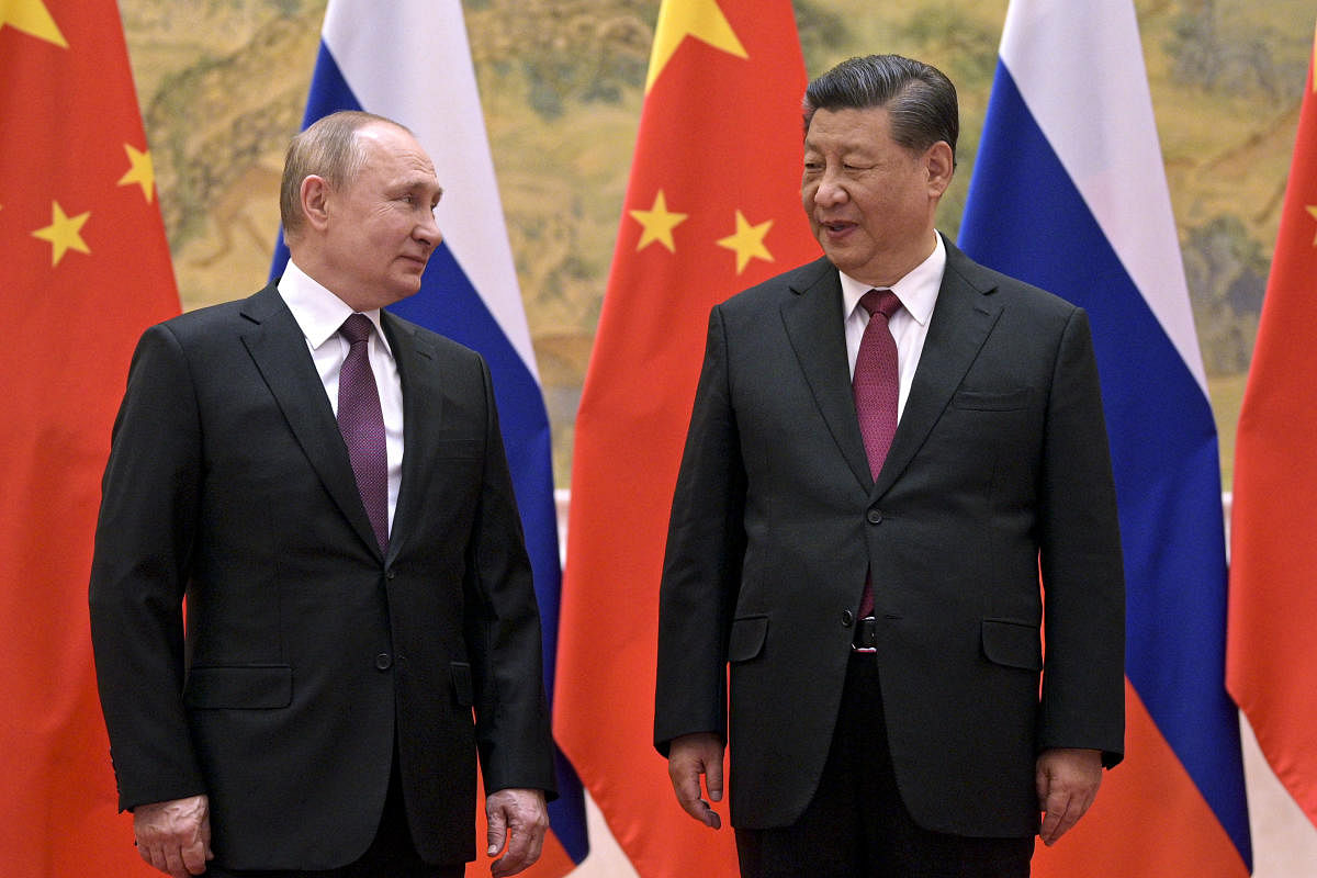  Russia President Vladimir Putin (L) and China President Xi Jinping. Credit: AP/PTI File Photo