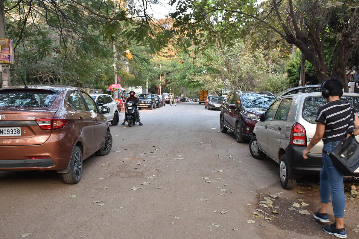 On weekends, roads in areas like Indiranagar are jampacked with parked cars. Some roads see cars parked on both sides. DH Photo by BK Janardhan