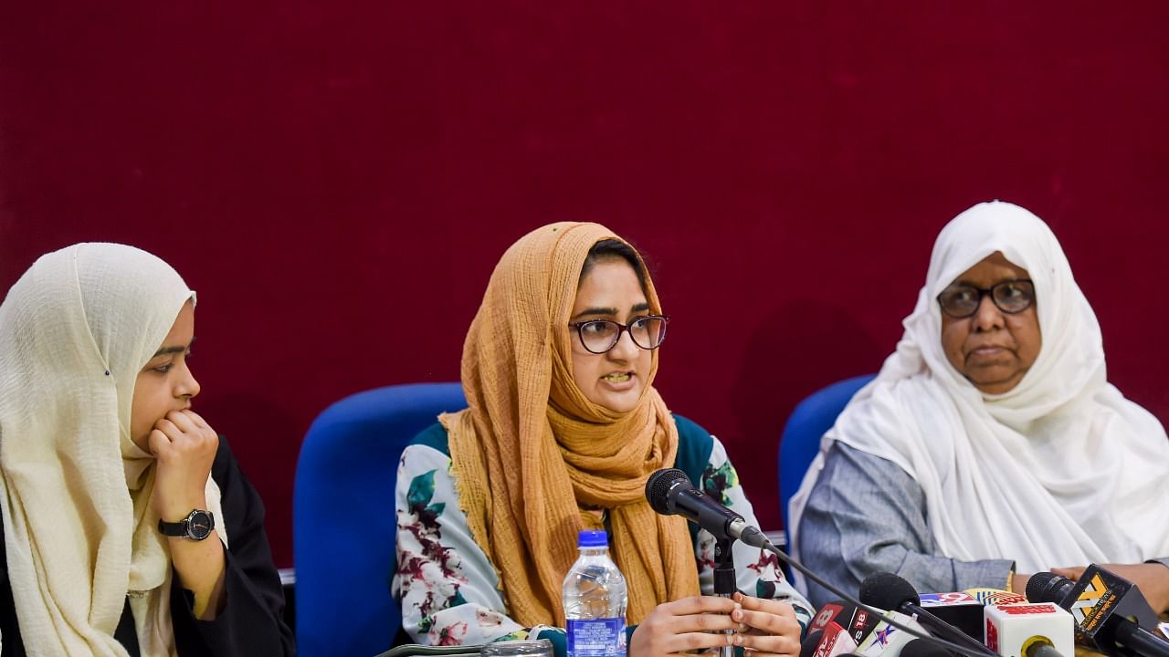 Muslim women address a press conference against the Karnataka High Court's verdict on 'Hijab' at Press Club of India, in New Delhi. Credit: PTI photo