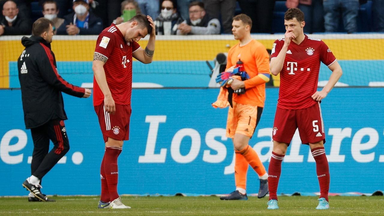 Bayern Munich's Niklas Sule and Benjamin Pavard look dejected after the match against TSG 1899 Hoffenheim. Credit: Reuters Photo