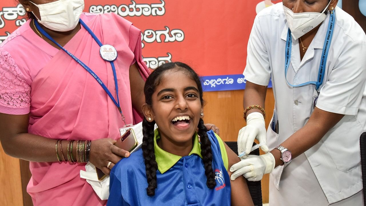 A girl receives the Corbevax vaccine at Bowring hospital on Wednesday. Credit: DH Photo/Anup Ragh T