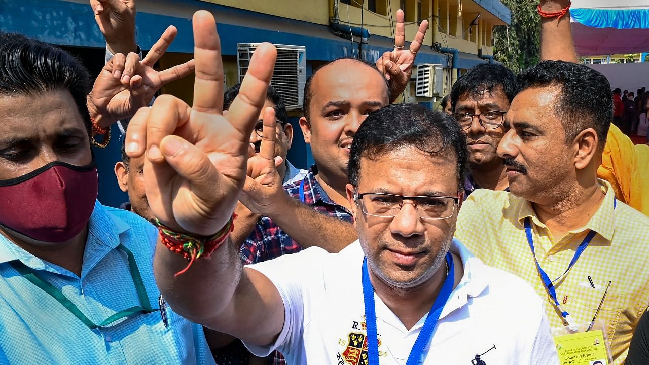 Rane holds the victory sign during the counting day. Credit: PTI Photo