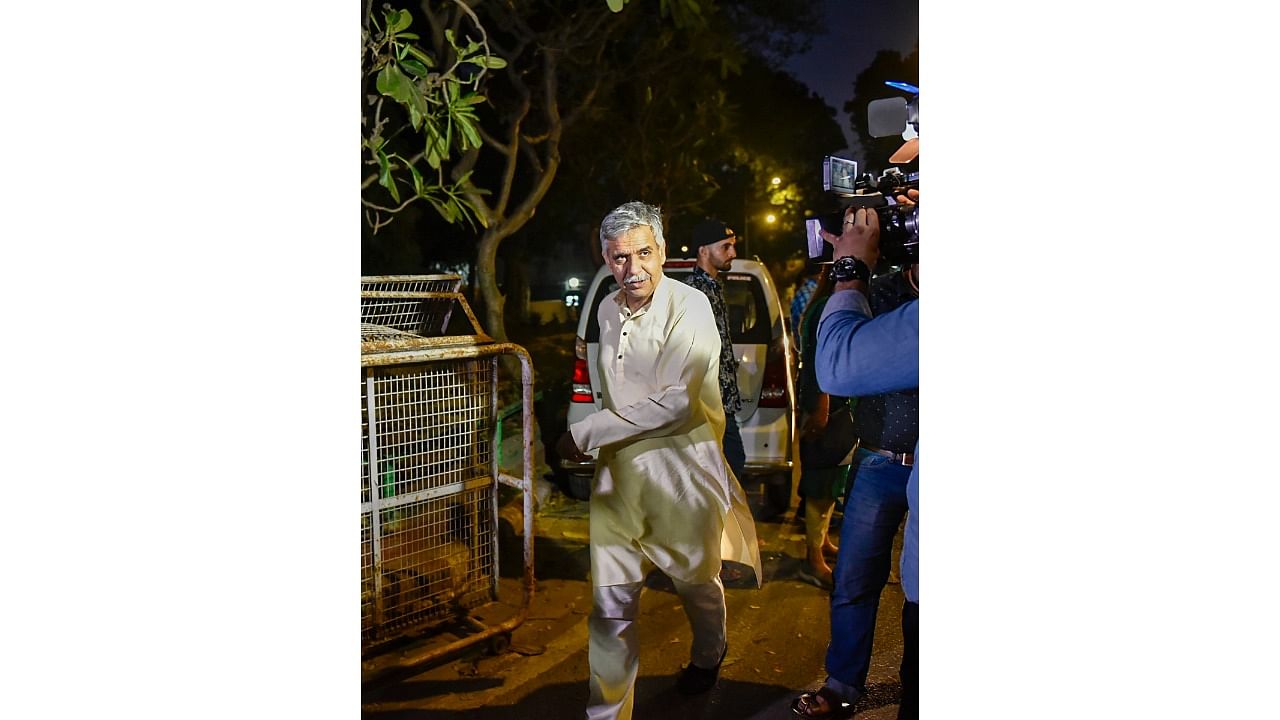Congress leader Sandeep Dikshit arrives for the Congress G-23 leaders' meeting at party leader Ghulam Nabi Azad's residence. Credit: PTI Photo