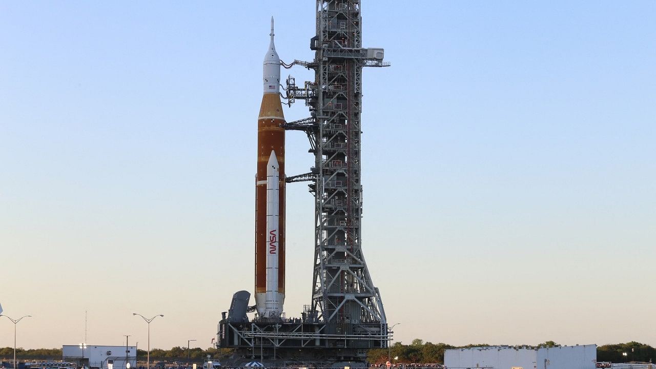 NASA's next-generation moon rocket begins its slow-motion journey from the VAB to its launch pad at Cape Canaveral. Credit: Reuters Photo