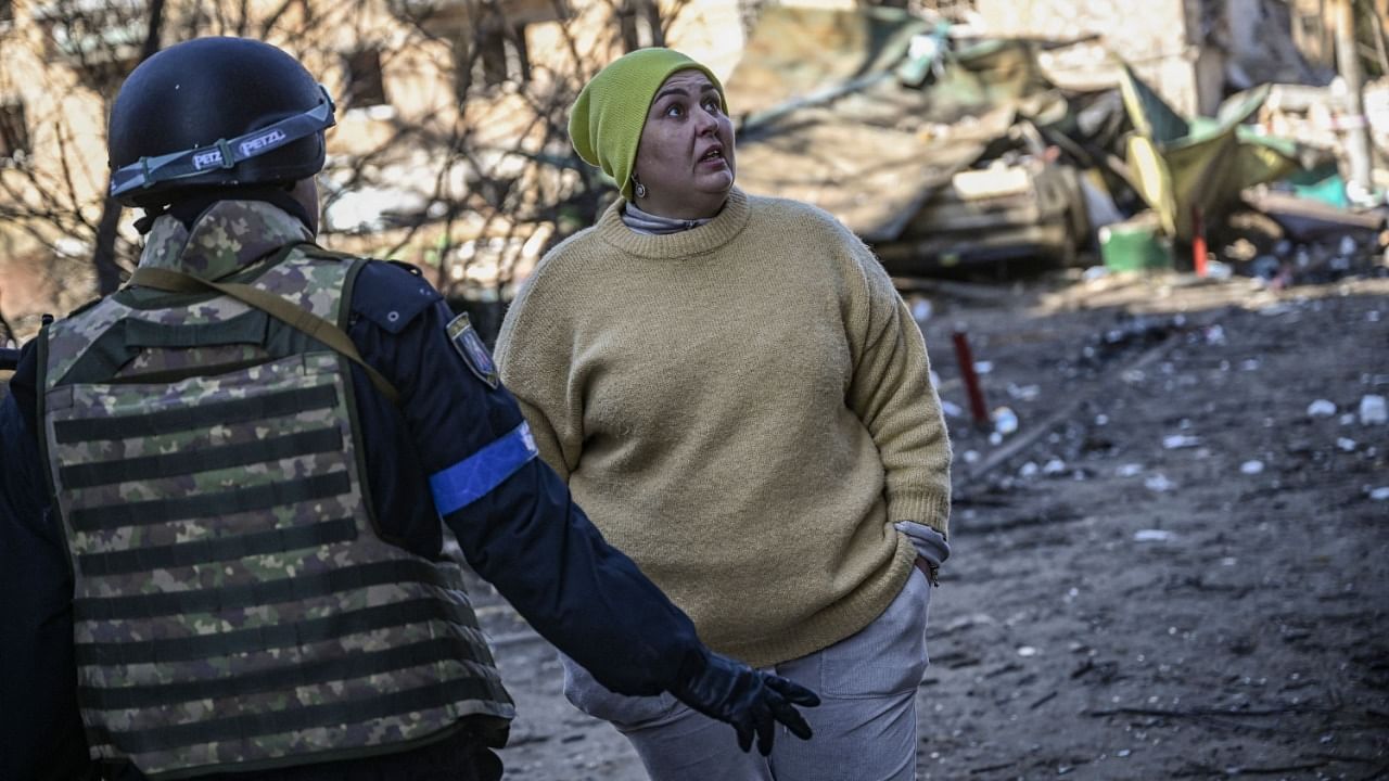 Authorities in Kyiv said one person was killed early today when a downed Russian rocket struck a residential building in the capital's northern suburbs. They said a school and playground were also hit. Credit: AFP Photo