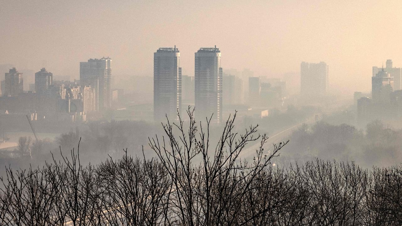  A picture shows a general view of Kyiv, the Ukrainian capital with smoke in the air on March 19, 2022. Credit: AFP Photo