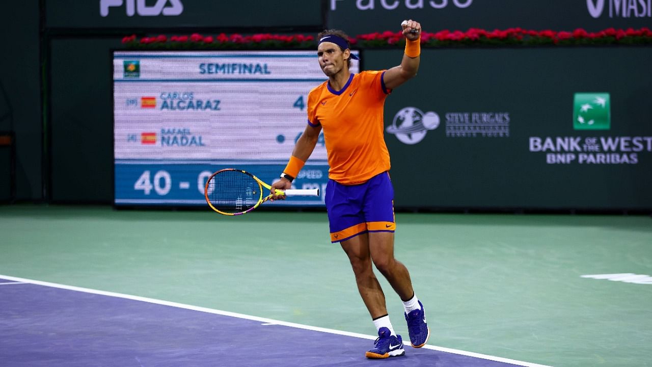 Rafael Nadal of Spain celebrates match poin against Carlos Alcaraz of Spain in their semifinal match on Day 13 of the BNP Paribas Open at the Indian Wells Tennis Garden. Credit: AFP Photo