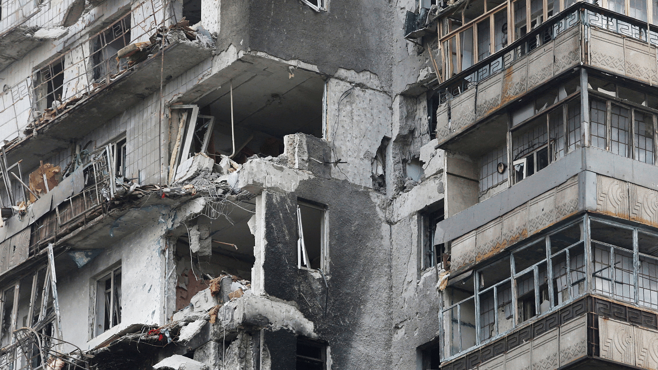 A view shows a damaged residential building in the besieged city of Mariupol. Credit: Reuters Photo