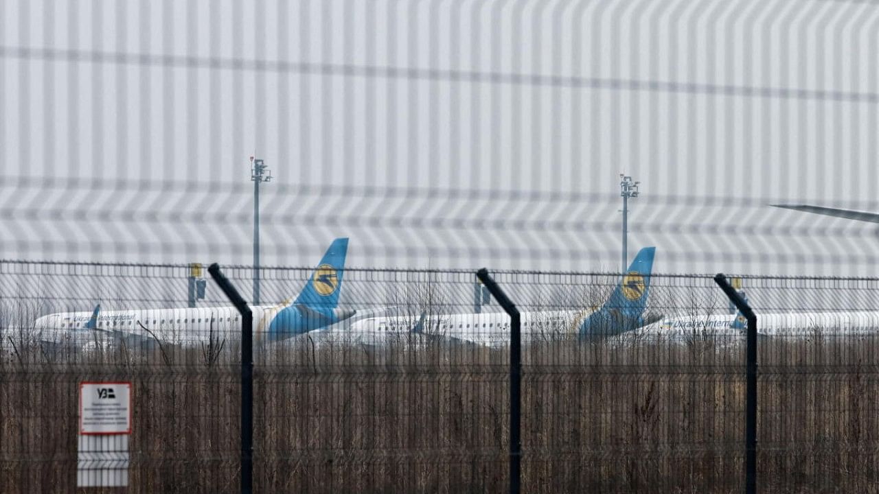 Parked planes are seen at Boryspil International Airport after Russia launched a massive military operation against Ukraine. Credit: Reuters Photo