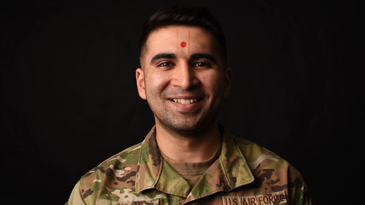 Senior Airman Darshan Shah, an aerospace medical technician assigned to the 90th Operational Medical Readiness Squadron, poses while wearing a Tilak Chandlo, a Hindu marking, on F.E. Warren Air Force Base, Wyoming. Credit: US Air Force photo by Airman 1st Class Charles Munoz