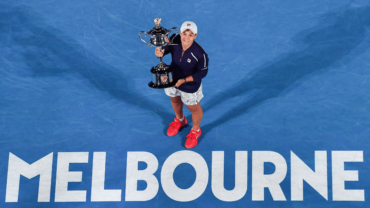 Australia's Ashleigh Barty posing with the trophy after winning against Danielle Collins of the US during their women's singles final match. Credit: AFP Photo