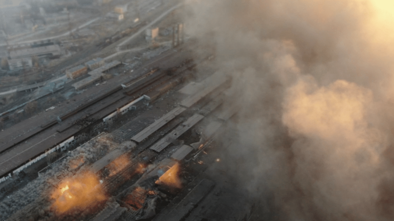 Multiple explosions and rising smoke are seen around an industrial compound, in Mariupol. Credit: Reuters Photo