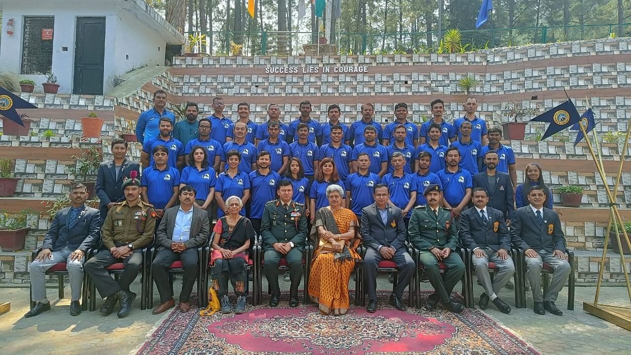 Students who have completed the high altitude training successfully are honoured with a badge (a small ice axe) by the hands of Prof Bisht. Credit: Special Arrangement