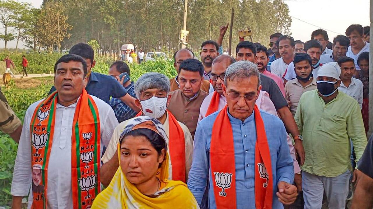 Members of a committee set up to inverstigate the death of those killed in violence that broke out at Bogtui village on Tuesday morning, in Birbhum. Credit: PTI Photo