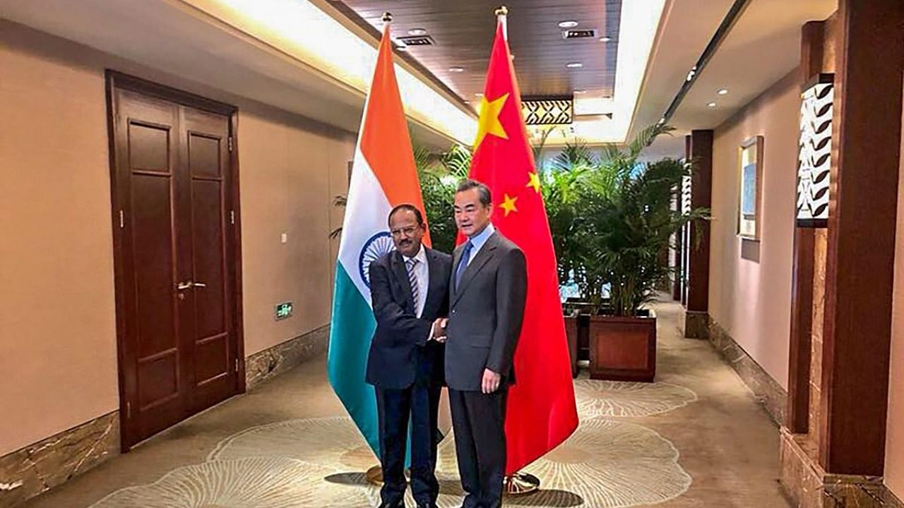 National Security Advisor, Ajit Doval shakes hands with Chinese Foreign Minister, Wang Yi ahead of the 21st round India-China Border talks at Dujiangyan city, in Sichuan province of China, Saturday, Nov.24, 2018. Credit: Handout via PTI