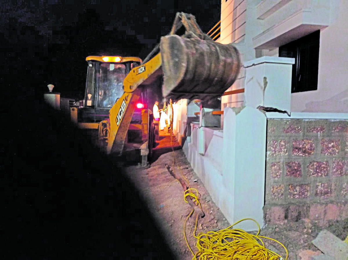 Houses that were constructed illegally on the land reserved for sea erosion victims at Madyar were demolished by the Ullal CMC officials.