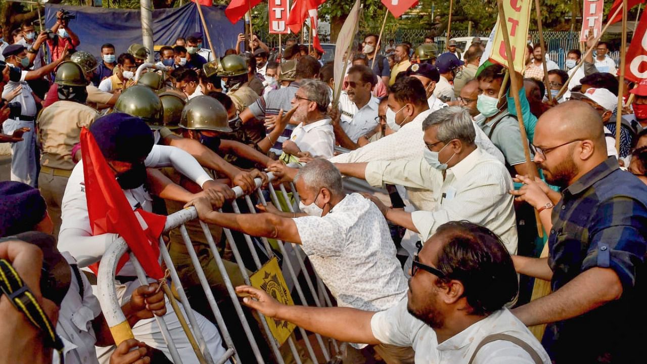 Members of all Trade Union (Congress and Left Front) in support of a nationwide strike, in Kolkata. Credit: PTI Photo