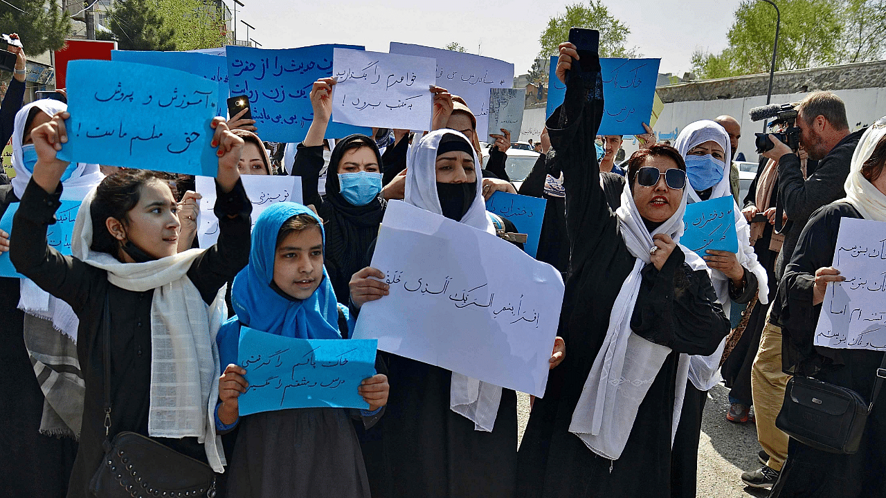 Afghan women and girls take part in a protest in front of the Ministry of Education in Kabul. Credit: AFP Photo