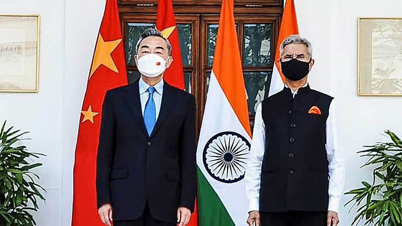 External Affairs Minister S Jaishankar with China's Foreign Minister Wang Yi during their meeting at Hyderabad House in New Delhi. Credit: PTI Photo
