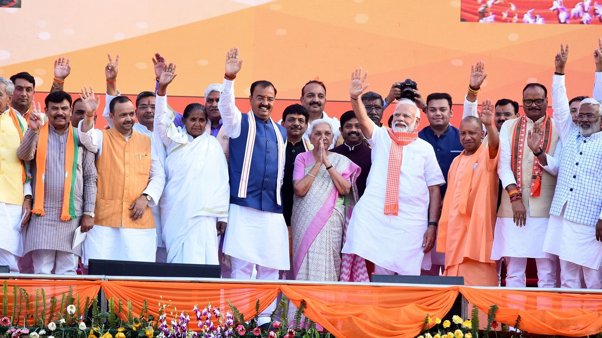Prime Minister Narendra Modi along with Yogi Adityanath and other leaders during the oath ceremony at Atal Bihari Ekana Stadium. Credit; IANS Photo