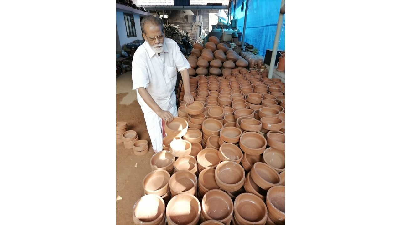 It's been nine years since Sreeman Narayanan has been distributing earthen pots to retain water for birds during summers. Credit: Special Arrangement