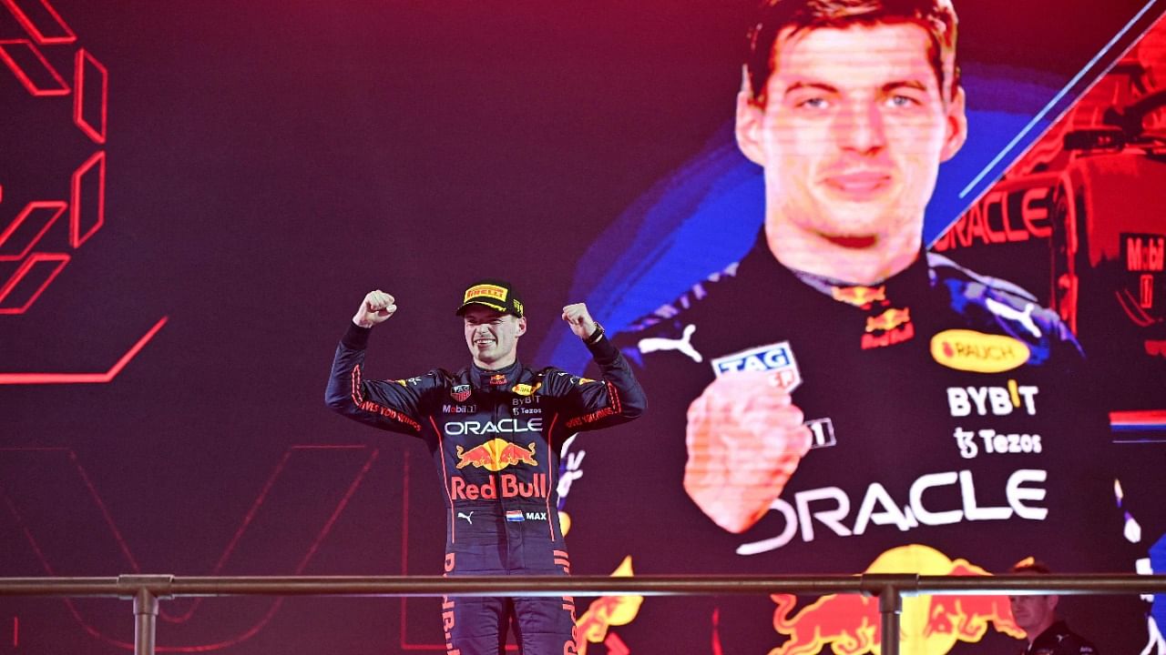 Verstappen celebrates after his win. Credit: AFP Photo