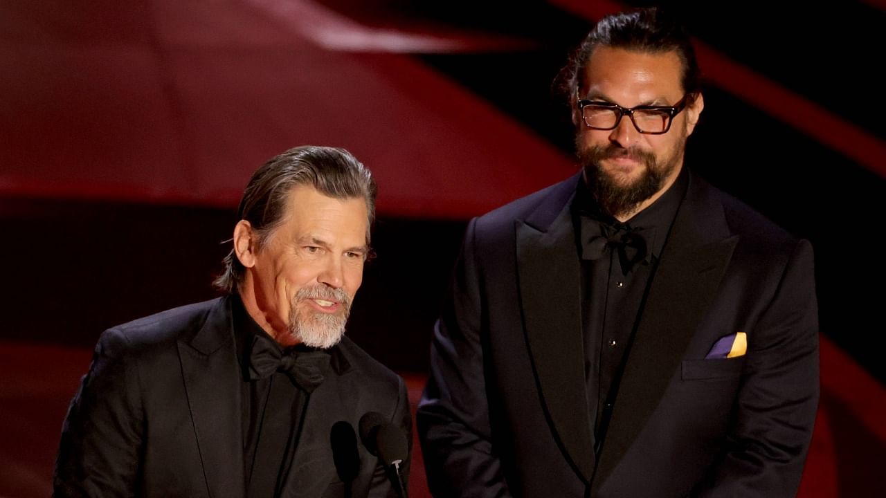 Josh Brolin and Jason Momoa speak onstage during the 94th Annual Academy Awards. Credit: AFP Photo