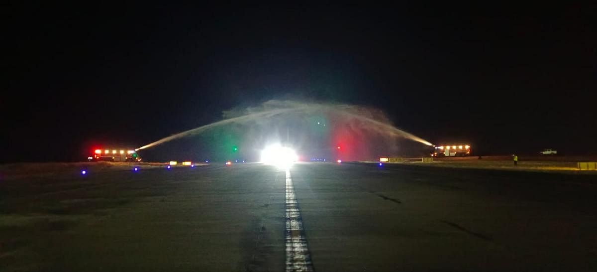 A water cannon salute is given to an Indigo flight on its arrival at Mangaluru International Airport in the wee hours of Monday. Photo by special arrangement