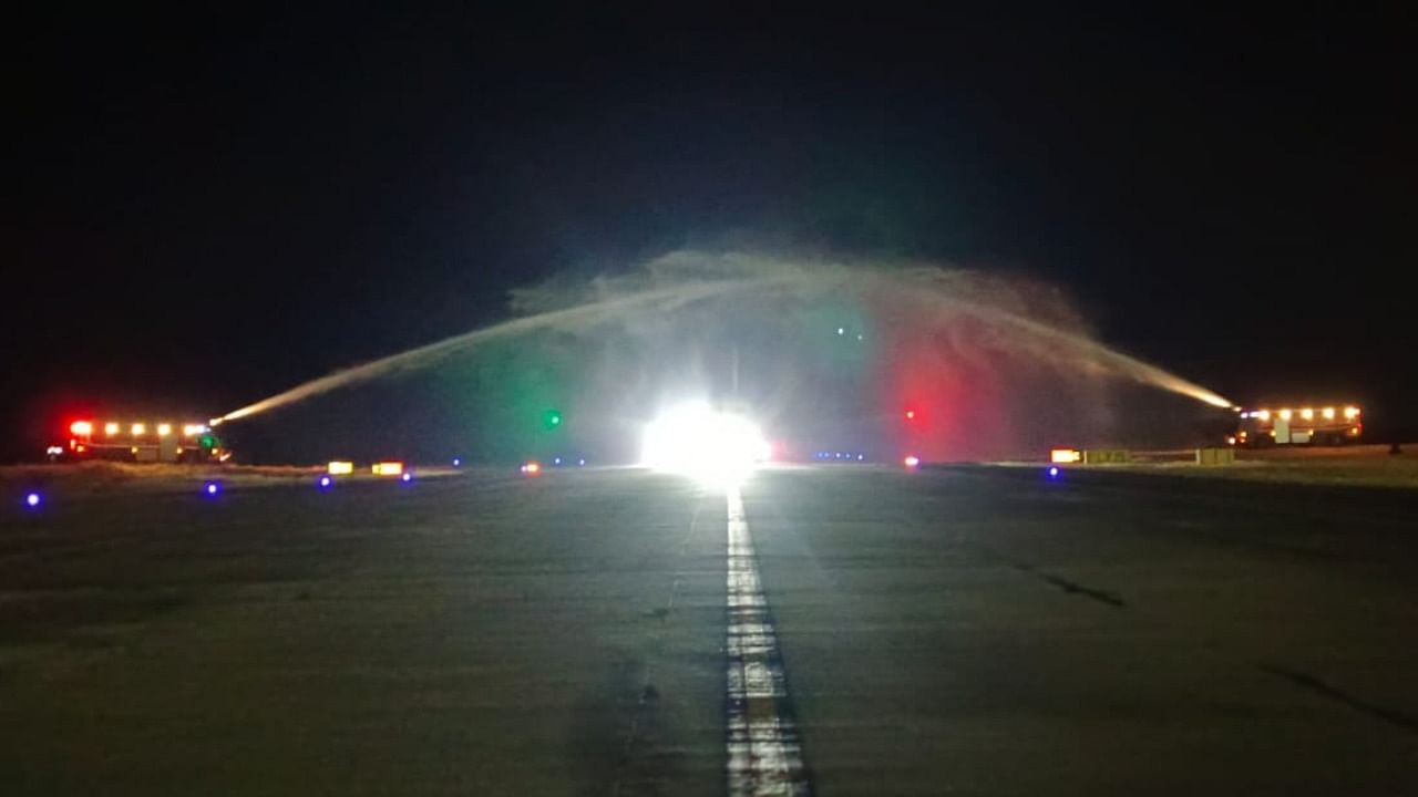 Water cannon salute being given to the Indigo flight on its arrival at Mangaluru International Airport in the wee hours of Monday.  Credit: Special arrangement