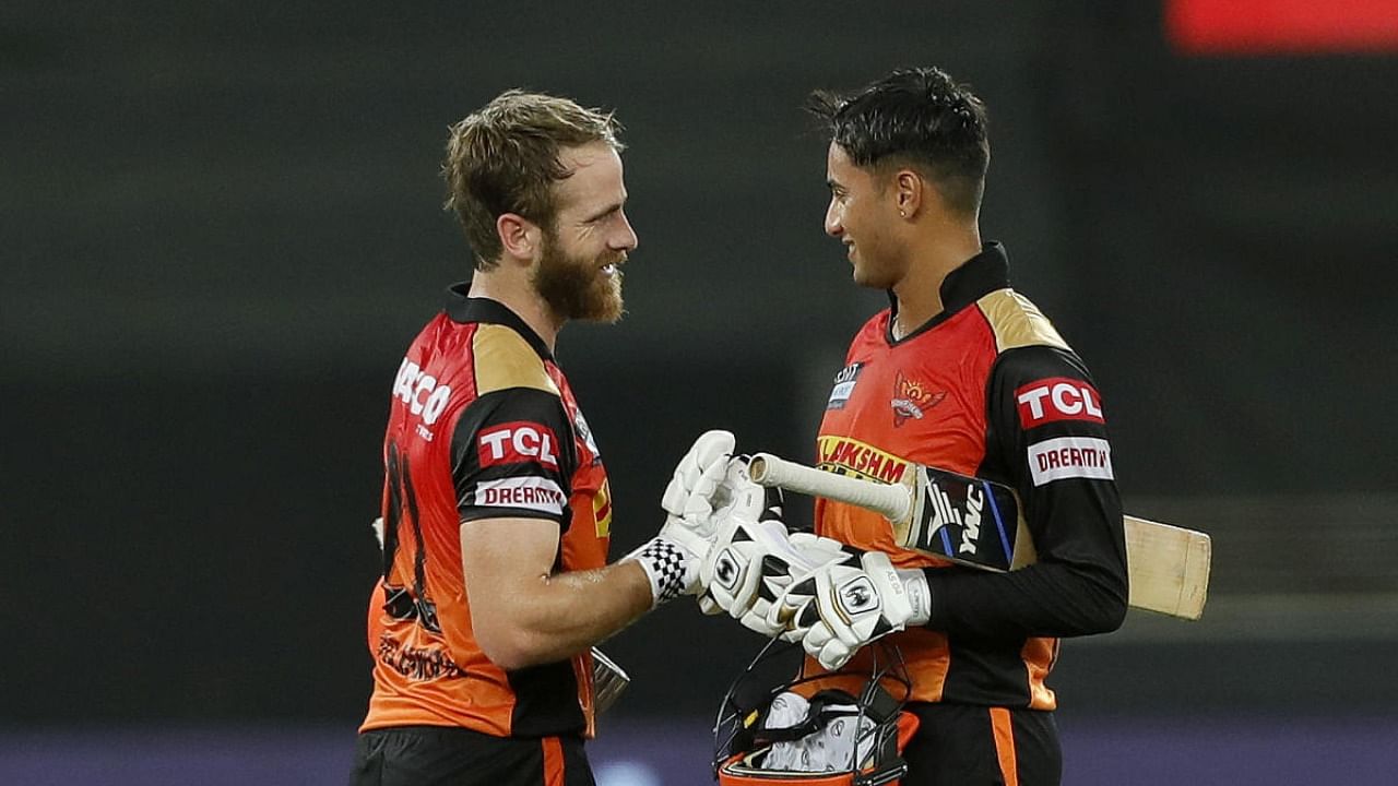 Kane Williamson captain of Sunrisers Hyderabad and Abhishek Sharma of Sunrisers Hyderabad at the end of match 40 of the Indian Premier League between the Sunrisers Hyderabad and the Rajasthan Royals, at the Dubai International Stadium in the United Arab Emirates, Monday, Sept. 27, 2021. Credit: PTI Photo