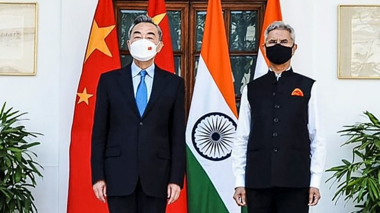 Jaishankar with China's Foreign Minister Wang Yi. Credit: Twitter/ @DrSJaishankar
