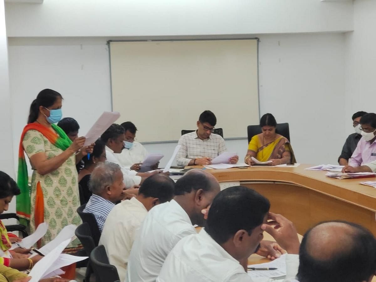 Mayor Premananda Shetty chairs a meeting in Mangaluru. 