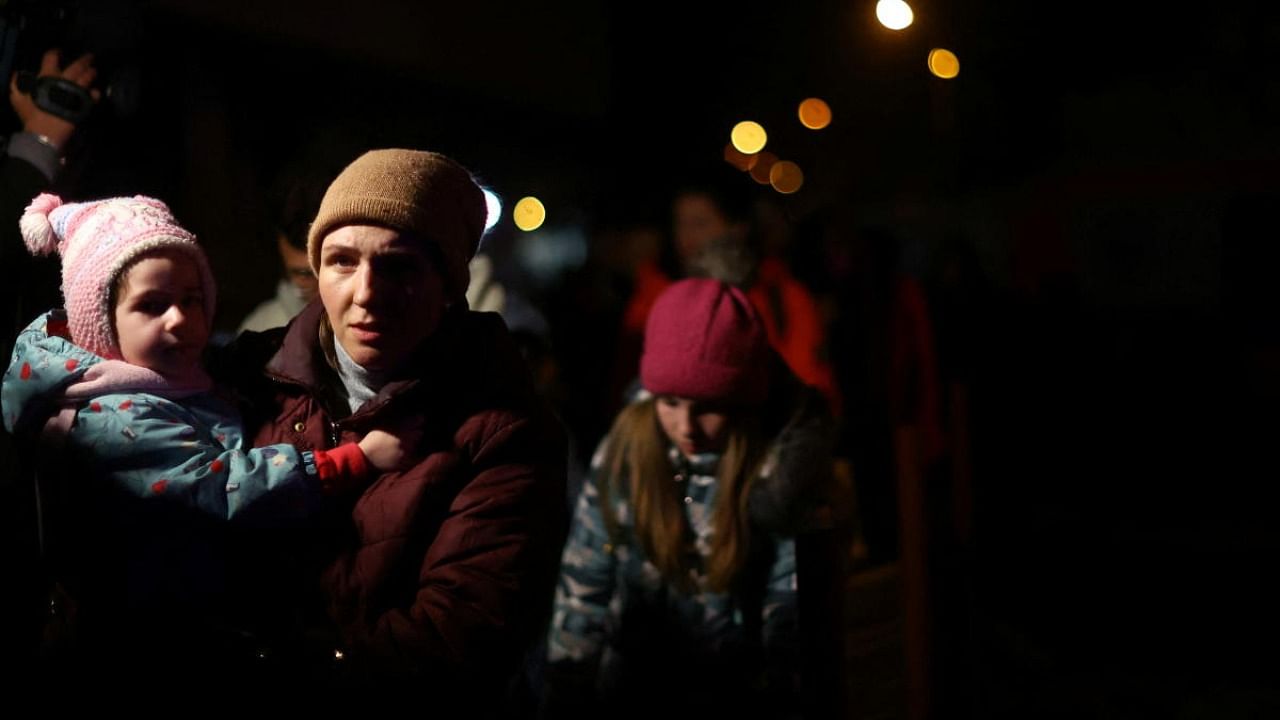 Ukrainian refugees wait to board a train to be able to return to Ukraine outside Przemysl Glowny train station, after fleeing the Russian invasion of Ukraine, in Przemysl. Credit: Reuters photo