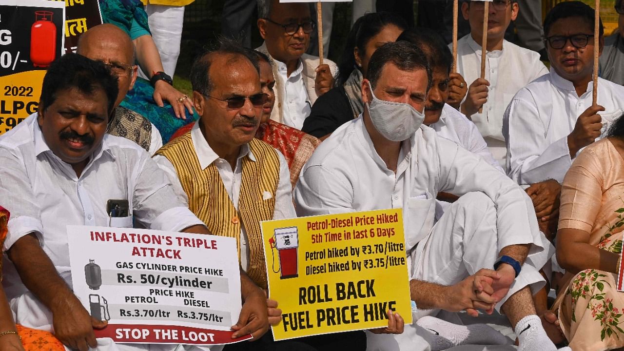 Congress Party leader Rahul Gandhi (C) along with other Congress MPs (Member of Parliament) take part in a demonstration against the rising fuel prices near the Indian Parliament in New Delhi. Credit: AFP Photo
