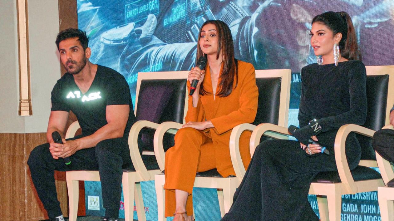 Bollywood actors John Abraham, Jacqueline Fernandez and Rakul Preet during promotion of upcoming movie 'Attack' in Noida, Saturday, March 26, 2022. Credit: PTI Photo